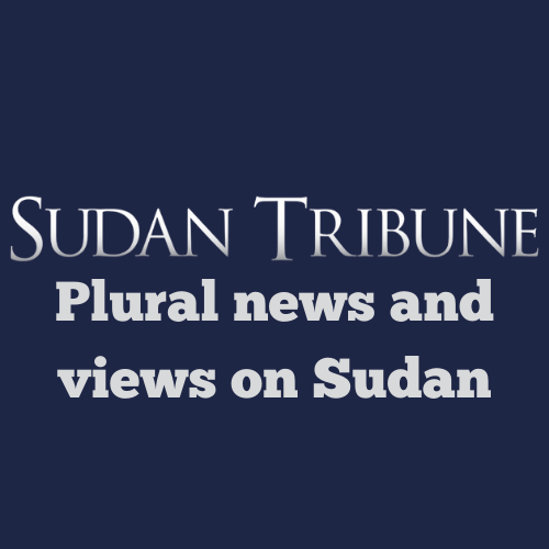Al-Burhan shakes hands with Egyptian ambassador to Sudan on January 10, 2023