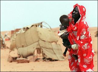 A_Sudanese_refugee_carrying_her_baby.jpg