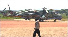 Two_Sudanese_military_helicopters_at_El-Geneina_airport.jpg