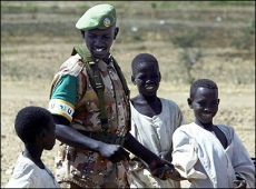 A_Rwandan_soldier_plays_with_children_.jpg