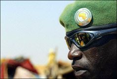 Rwandan_soldier_patrols_Abu_Shouk.jpg