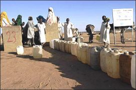 Displaced_people_collect_water.jpg