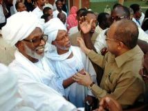 Hassan_Turabi_receives_justice_minister.jpg