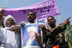 Sudanese_protestors_hold.jpg