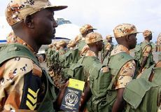 Rwandan_soldiers_wait_to_board.jpg