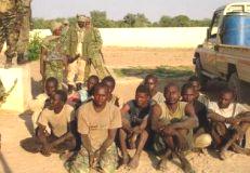 Chadian_troops_guard_rebel.jpg
