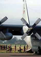 Rwandan_soldiers_board_a_C-130.jpg