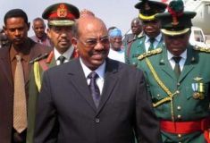 al-Bashir_is_greeted_by_Nigerian.jpg