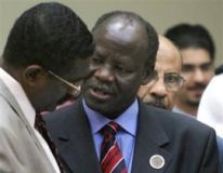 Sudan_s_FM_Lam_Akol_Ajawin_talks_with_an_aid.jpg