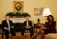 President George W. Bush and Secretary of State Condoleezza Rice sit in the Oval Office with Rich Williamson, Special Envoy for Sudan Thursday, Jan. 17, 2008