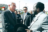 Salva Kiir (right) greeted by Egyptian Prime minister Ahmed Nazeef. (AP)