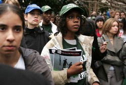 Demonstrators listen to a speaker after a march sponsored by The Save Darfur Coalition to mark International Human Rights Day with a Dream for Darfur Torch Relay through the streets of Washington, DC to China's embassy, 10 December 2007 (AFP)