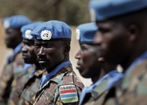 Gambian soldiers serving with the UNAMID stand on parade during celebrations marking the International Day for the United Nations Peacekeepers Day at a camp in El Fasher, the capital of North Darfur, on May 29, 2008 (AFP)