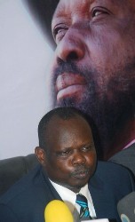 Pagan Amum, the number two in the Sudan People's Liberation Movement, chaired by First Vice President Salva Kiir (portrait-background), speaks during a press conference in Khartoum on May 26, 2008 (AFP)