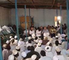 ICC former Registrar, Mr Bruno Cathala meeting with Darfur refugees  at the Farchana camp in Chad (ICC Website)