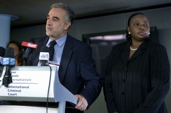 International Criminal Court (ICC) Prosecutor Luis Moreno-Ocampo speaks beside assistant prosecutor Fatou Bensouda (R) during a news conference in the Hague July 14, 2008 (Reuters)