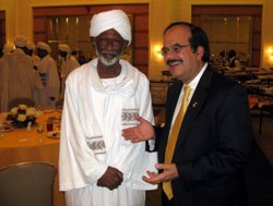 US charge d’Affaires to Alberto Fernandez (R) gestures next to Dr. Hassan Al-Turabi head of the Popular Congress Party (PCP) (US Embassy Photo)