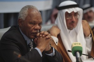 File photo showing Sudan's Finance Minister Awad Ahmed Al-Jaz (L) attending a news conference (Reuters)