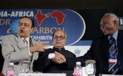 Indian Minister for Petrol and Natural Gas, Murli Deora, left, and Indian External Affairs Minister, Pranab Mukherjee, center, welcome Sudanese Minister for Energy and Mining, Awad Ahmed Al-Jaz at an India-Africa Hydrocarbon Conference and Exhibition in New Delhi, India, Tuesday, Nov. 6, 2007 (AP)