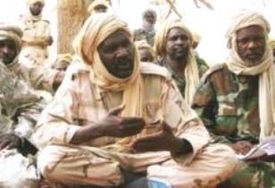 Khalil Ibrahim, rebel leader of the JEM, during a meeting with AU envoy to Darfur Salim Ahmed Salim in the area of Kariarii, near the Chadian border July 8, 2007