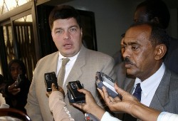 Russian envoy to Sudan Mikhail Margelov (L) speaks to the media next to Ali Sadij, an official in the Sudanese Foreign Affairs Ministry, after meeting Sudanese Foreign Minister Deng Alor in Khartoum January 25, 2009 (AFP)