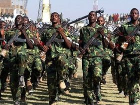Sudanese PDF members march during a ceremony for the 18th anniversary of the national Popular Defence Forces in Madani Nov 17, 2007 (AFP)
