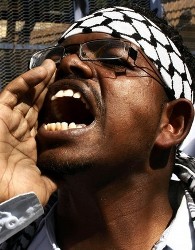 A Sudanese man shouts anti-Israel slogans during a demonstration in the streets of the capital Khartoum January 6, 2009 (Reuters)