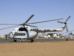 Helicopter of the United Nations-African Union Mission in Darfur (UNAMID) flies a wounded Sudanese driver shot seven times during an attack on the mission convoy (UN Photo)