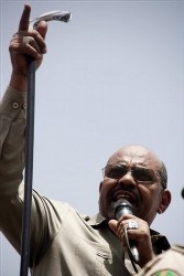 Sudanese President Omar al-Bashir greets his supporters in Darfur's capital of al-Fasher, Sudan, Wednesday, July 23, 2008 (AP)