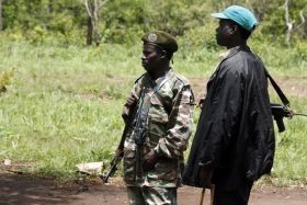 LRA soldiers keep guard at the assembly point in Ri-Kwangba on the Sudan-Congo border, Western Equatoria, April 10, 2008. (Reuters)
