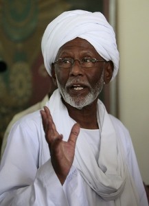 Islamist opposition leader Hassan al-Turabi, 76, speaks to journalists at his house in Khartoum March 9, 2009 (Reuters)