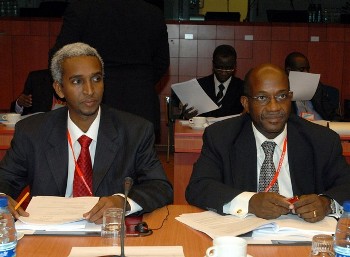 File Photo showing Djibouti's Minister for Economy Ali Farah Asoweh and the representative of the Ivory Coast, Marius Bessy (R), attend an EU-ACP meeting held at the European Council in Brussels (AFP)