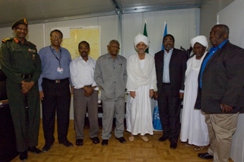 The Sudanese Presidential Adviser Attabani poses for a photo with UNAMID chief Adada and the members of their delegations, El Fasher June 11, 2009 (UNAMID-Nektarios Markogiannis)