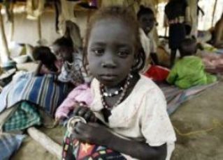 A displaced girl from Abyei rests at an emergency food distribution point in Agok, south Sudan (file photo - Reuters)