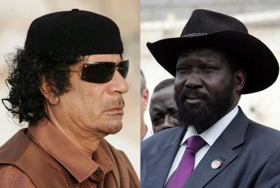 Libyan leader Muammar Gaddafi (L) and Sudanese First Vice President Salva Kiir, the head of the Sudan People's Liberation Movement (SPLM) (R)