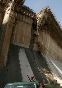 Soldiers stand guard near the new built Merowe Dam in northern Sudan (Reuters)