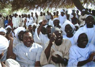 Rodolphe Adada (left), with the Sheikhs, Elders and Umdas of Muhajeriy, Darfur (file photo-UNAMID)