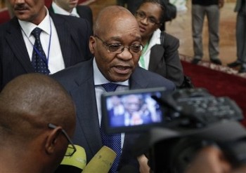 President of South Africa Jacob Zuma talks to reporters after attending the closing session at the third day of the 13th African Union summit of heads of state and government in Sirte, Libya, Friday, July 3, 2009 (AP)