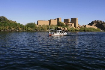 A small boat passes Elephantine island in the River Nile, off the southern town of Aswan, 800 kms south of the Egyptian capital Cairo (AFP)
