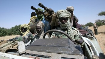 File pictures dated October 17, 2007 shows fighters of the Sudanese Justice and Equality Movement (JEM) driving their armoured battle wagon at an unknown location on the Sudan-Chad border in northwest Darfur (AFP)