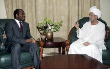 Sudanese advisor to the president, Ghazi Salah Al-deen al-Attabani (R), meets with Joint United Nations and African Union mediator for Darfur Djibril Bassole in Khartoum on July 15, 2009. (Getty Images)