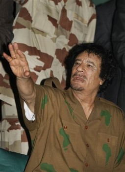Libyan leader Moammar Gadhafi gestures after a lavish outdoor theatrical performance at Green Park in Tripoli, Libya, late night Tuesday, Sept. 1, 2009 (AP)