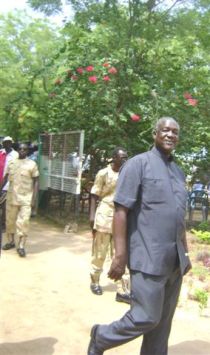 Governor Kuol Manyang moves toward his office after addressing a rally on Tuesday. (Phil. Thon Aleu -- ST)