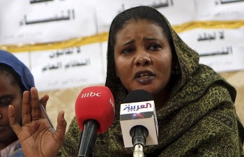 Lubna Hussein, a former journalist and U.N. press officer, addresses a news conference after her release in Sudan's capital Khartoum, September 8, 2009 (Reuters)