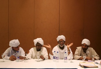 File photo in 2006 showing from left to right Ali Mahmoud Hassanein Deputy leader of the Democratic Unionist Party (DUP), Mohamed Ibrahim Nugud Secretary General of the Sudanese Communist Party (SCP), Hassan Al-Turabi leader of the Popular Congress Party (PCP), Al-Sadiq Al-Mahdi leader of the Umma Party (UNMIS Photo)