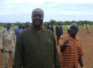 Gov. Kuol Manyang Juuk is being introduced to reporters by Deputy Gov. Hussien Mar Nyuot at Bor airstrip on Oct. 13, 2009 (Philip Thon Aleu -- ST)