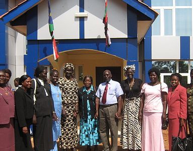 NBGS governor (C) and his deputy (at his right) pose, with some members of Warrap women delegation outside his office. (photo Sabrino Majok)