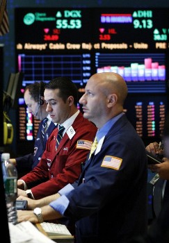 Traders work on the floor of the New York Stock Exchange (Reuters)