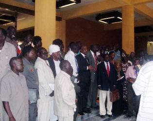 SPLM MPs led by Yasir Arman walking out of the National Assembly in Khartoum on Monday Oct 19, 2009