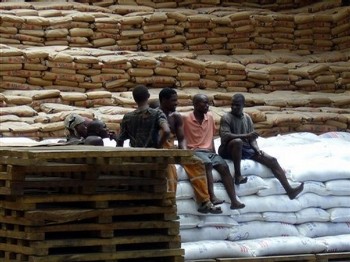 Workers rest during a lunch break at the U.N. World Food Program warehouse in Mombasa, Kenya on Wednesday, Dec. 3, 2008. The warehouse is used to store food aid to be distributed in Burundi, Kenya, Sudan, Somaliaand Uganda (AP)